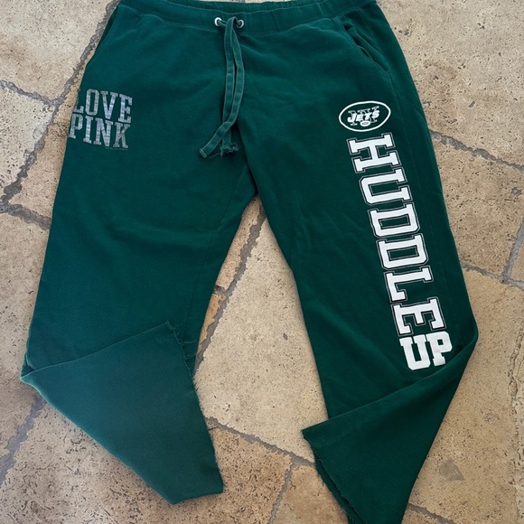 Victoria's Secret Pants - Pink New York Jets huddle up drawstring wide leg sweatpants -SZ L
D2